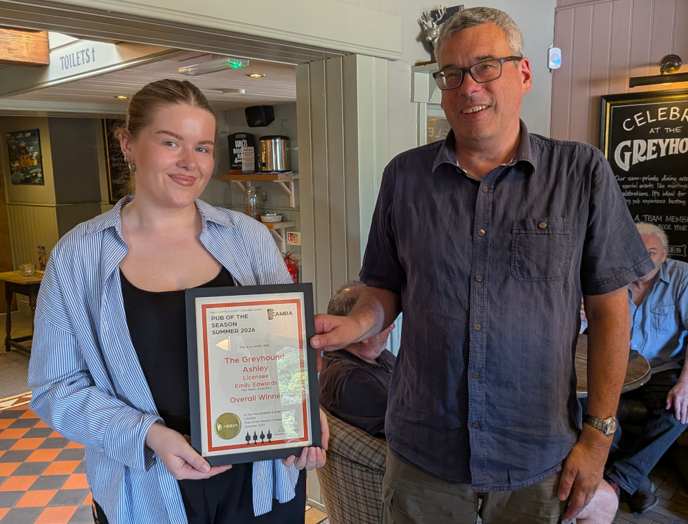Macclesfield & East Cheshire Branch Chair presenting Pub of the Month certificate to Jodie.